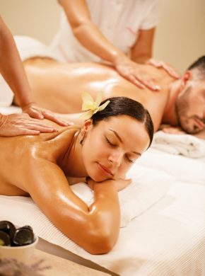 young-couple-relaxing-during-back-massage-health-spa-focus-is-young-woman-2